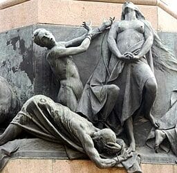 Stone sculpture of Atonement. Detail of the Monument to Dante in Trento by Cesare Zocchi