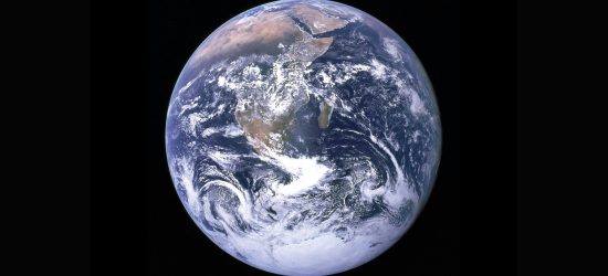 Earth from outer space, black sky all around it