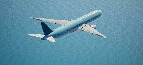 an airplane angled up in a blue sky